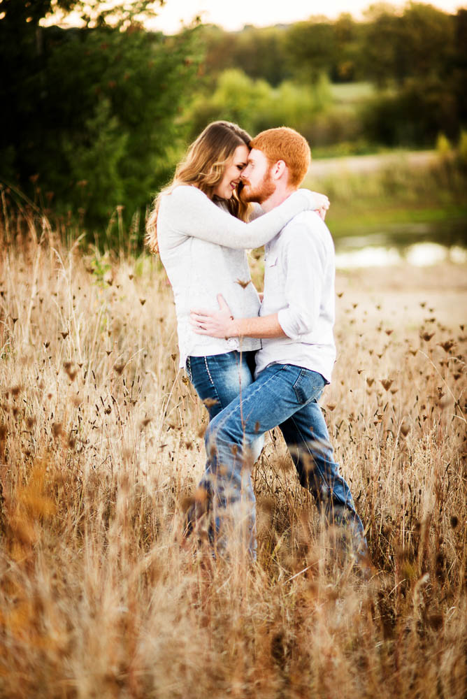 happy couple in a field