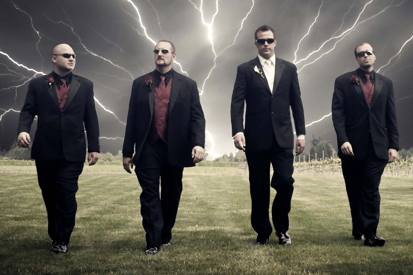 groom walking with groomsmen with lightning