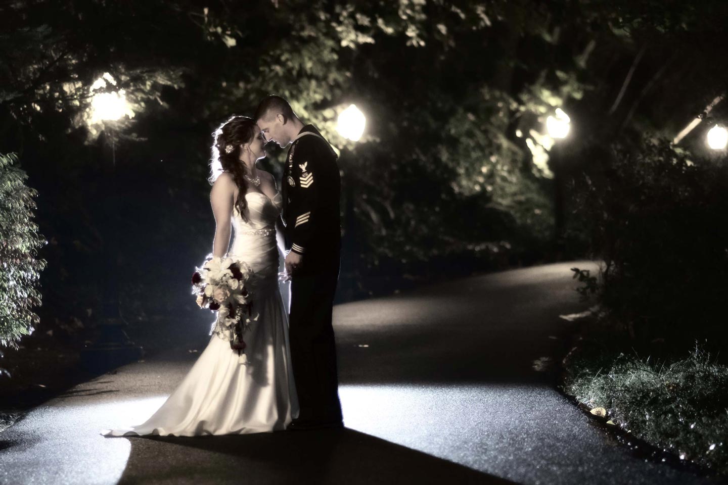 bride and groom in the moonlight